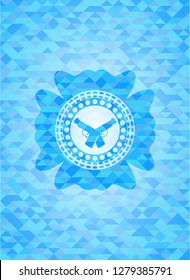 crossed pistols icon inside sky blue mosaic emblem