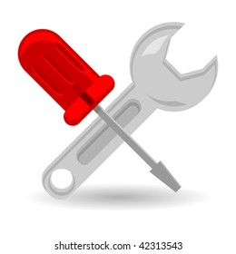 Crossed screwdriver and spanner isolated over white