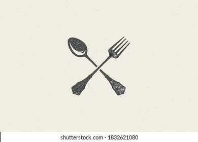 Crossed spoon and fork silhouette for food service hand drawn stamp effect vector illustration. Vintage grunge texture emblem for package and menu design or label decoration.