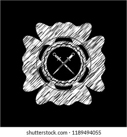 crossed swords icon drawn on blackboard