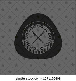 crossed swords icon inside black badge