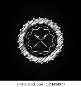 crossed swords icon inside chalk emblem written on a blackboard