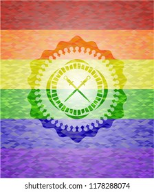 crossed swords icon inside emblem on mosaic background with the colors of the LGBT flag