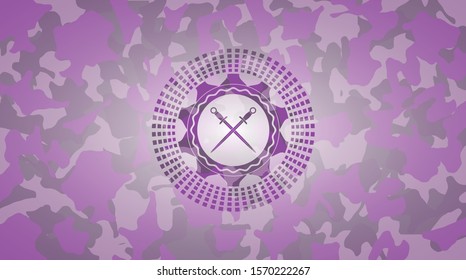 crossed swords icon inside pink camo emblem