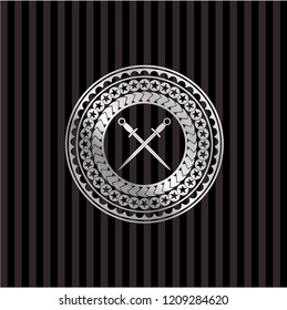crossed swords icon inside silver shiny badge