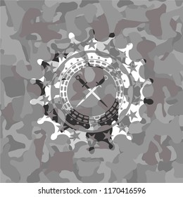 crossed swords icon on grey camouflaged texture