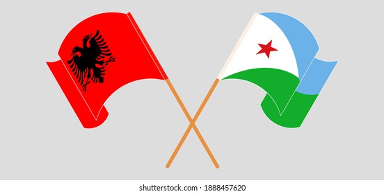 Crossed and waving flags of Albania and Djibouti