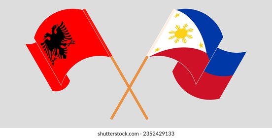 Crossed and waving flags of Albania and the Philippines. Vector illustration
