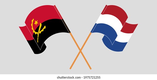 Crossed and waving flags of Angola and the Netherlands