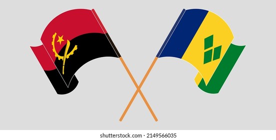 Crossed and waving flags of Angola and Saint Vincent and the Grenadines. Vector illustration