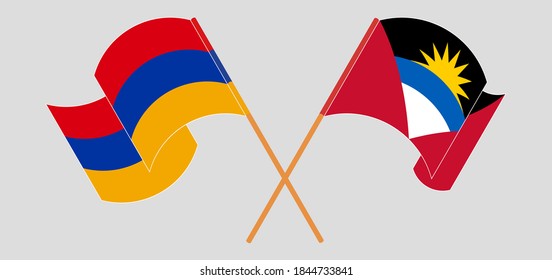 Crossed and waving flags of Antigua and Barbuda and Armenia