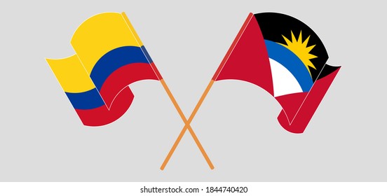 Gekreuzte und wehende Flaggen von Antigua und Barbuda und Kolumbien