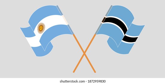 Gekreuzte und wehende Flaggen von Argentinien und Botsuana