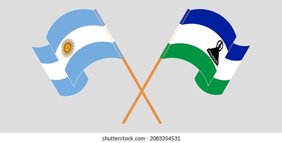 Crossed and waving flags of Argentina and Kingdom of Lesotho. Vector illustration
