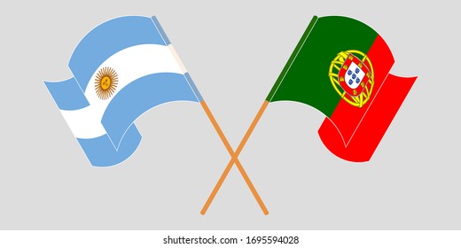 Crossed and waving flags of Argentina and Portugal