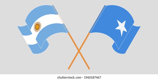 Crossed and waving flags of Argentina and Somalia