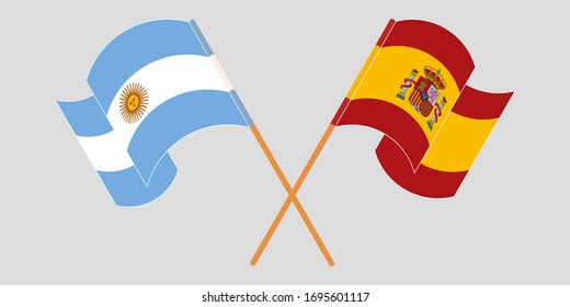 Crossed and waving flags of Argentina and Spain