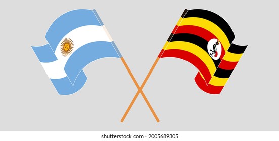 Crossed and waving flags of Argentina and Uganda