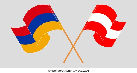 Banderas cruzadas y ondeando banderas de Armenia y Austria