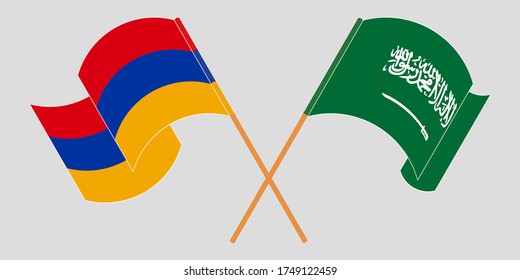 Crossed and waving flags of Armenia and the Kingdom of Saudi Arabia