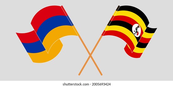 Crossed and waving flags of Armenia and Uganda