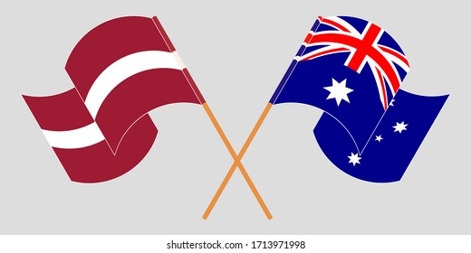 Crossed and waving flags of Australia and Latvia