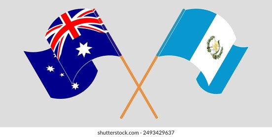 Crossed and waving flags of Australia and Republic of Guatemala. Vector illustration
