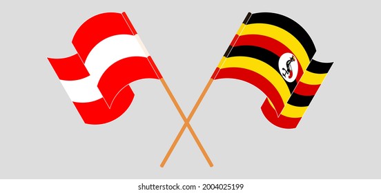 Crossed and waving flags of Austria and Uganda