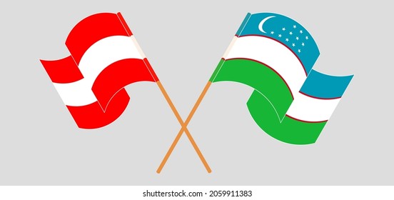 Crossed and waving flags of Austria and Uzbekistan