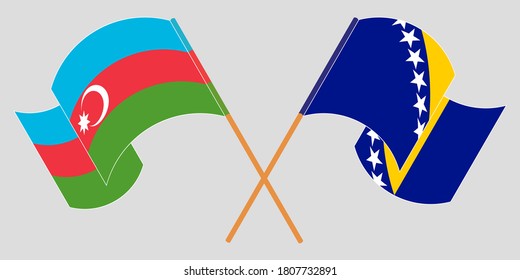 Crossed and waving flags of Azerbaijan and Bosnia and Herzegovina