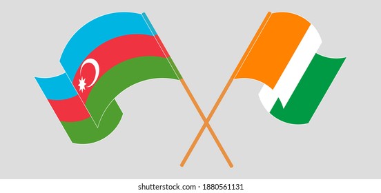 Crossed and waving flags of Azerbaijan and Republic of Ivory Coast