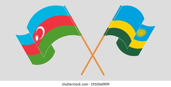 Crossed and waving flags of Azerbaijan and Rwanda