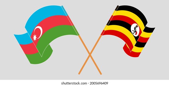 Crossed and waving flags of Azerbaijan and Uganda