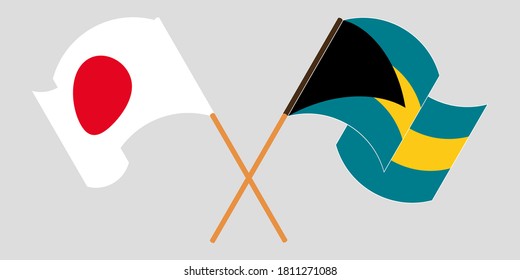 Crossed and waving flags of Bahamas and Japan