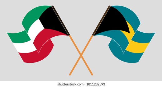 Banderas cruzadas y ondeando banderas de Bahamas y Kuwait