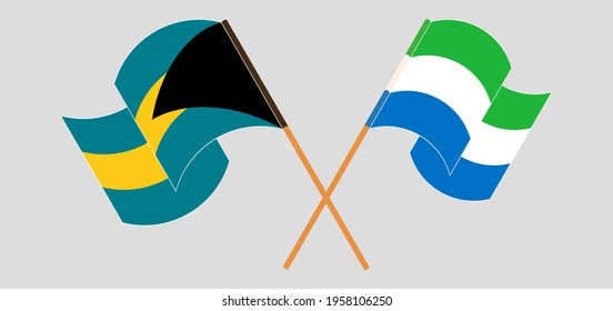 Crossed and waving flags of the Bahamas and Sierra Leone