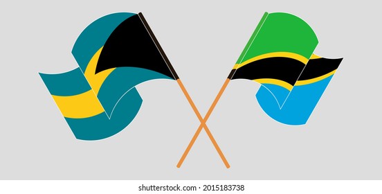 Crossed and waving flags of the Bahamas and Tanzania