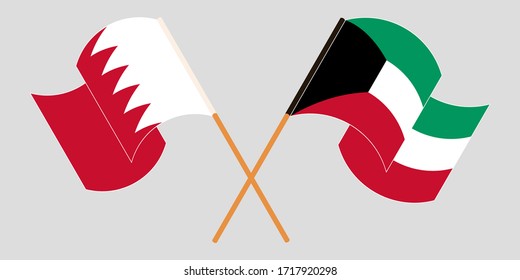 Crossed and waving flags of Bahrain and Kuwait