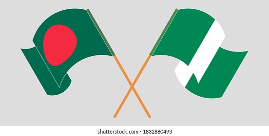 Crossed and waving flags of Bangladesh and Nigeria
