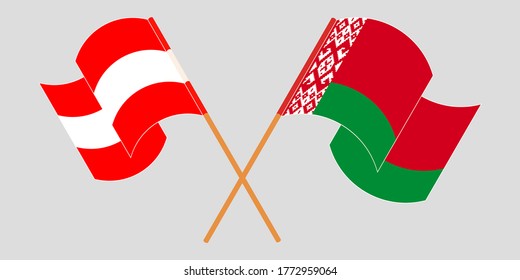 Gekreuzte und wehende Flaggen von Belarus und Österreich
