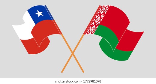 Crossed and waving flags of Belarus and Chile