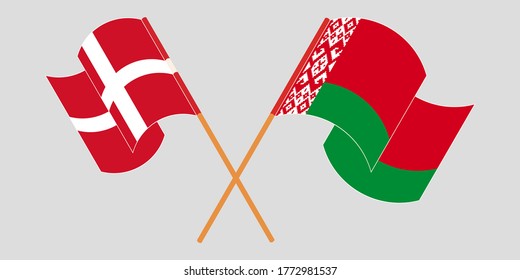 Banderas cruzadas y ondeando banderas de Bielorrusia y Dinamarca