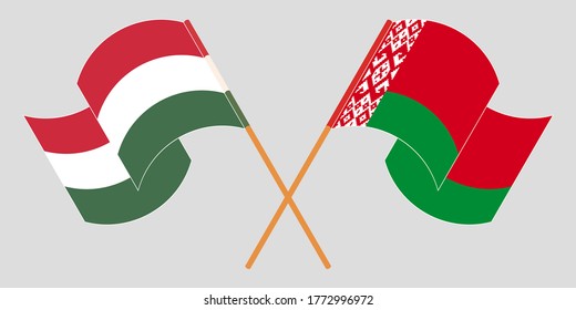 Cruzados y ondeando banderas de Bielorrusia y Hungría