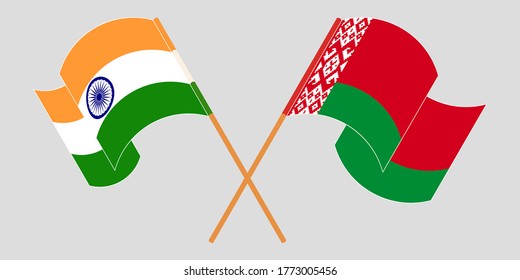 Crossed and waving flags of Belarus and India