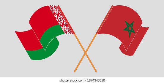 Crossed and waving flags of Belarus and Morocco