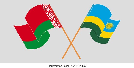 Gekreuzte und wehende Flaggen von Belarus und Ruanda