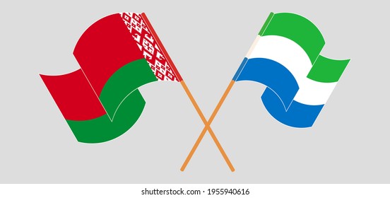 Crossed and waving flags of Belarus and Sierra Leone