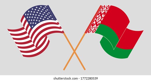 Crossed and waving flags of Belarus and the USA
