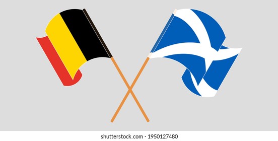 Crossed and waving flags of Belgium and Scotland