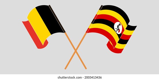 Überquerte und wehende Flaggen Belgiens und Ugandas